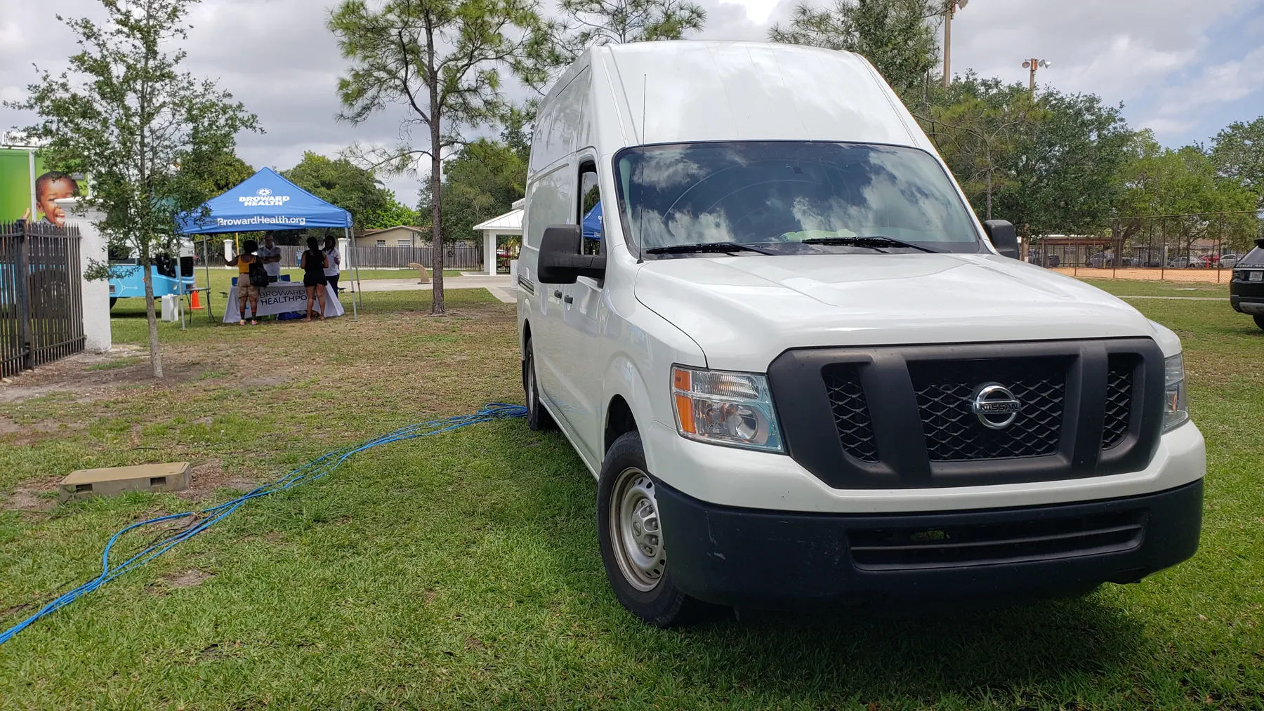 Primestar outside broadcast truck parked on the grass at the City of Lauderhill Health and Wellness Fair