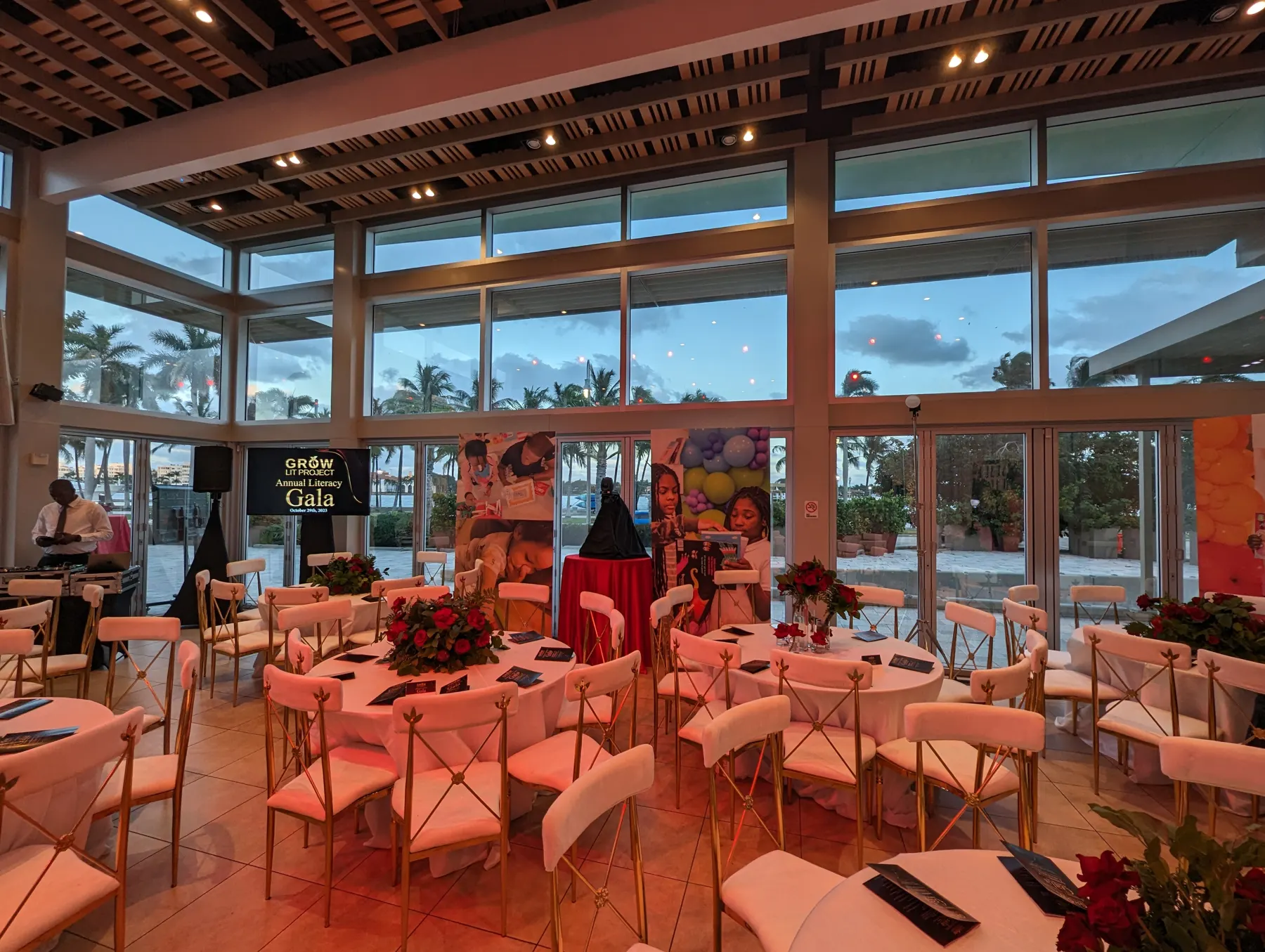 Gala tables and display monitors set up inside the Lake Pavilion overlooking the West Palm Beach waterfront