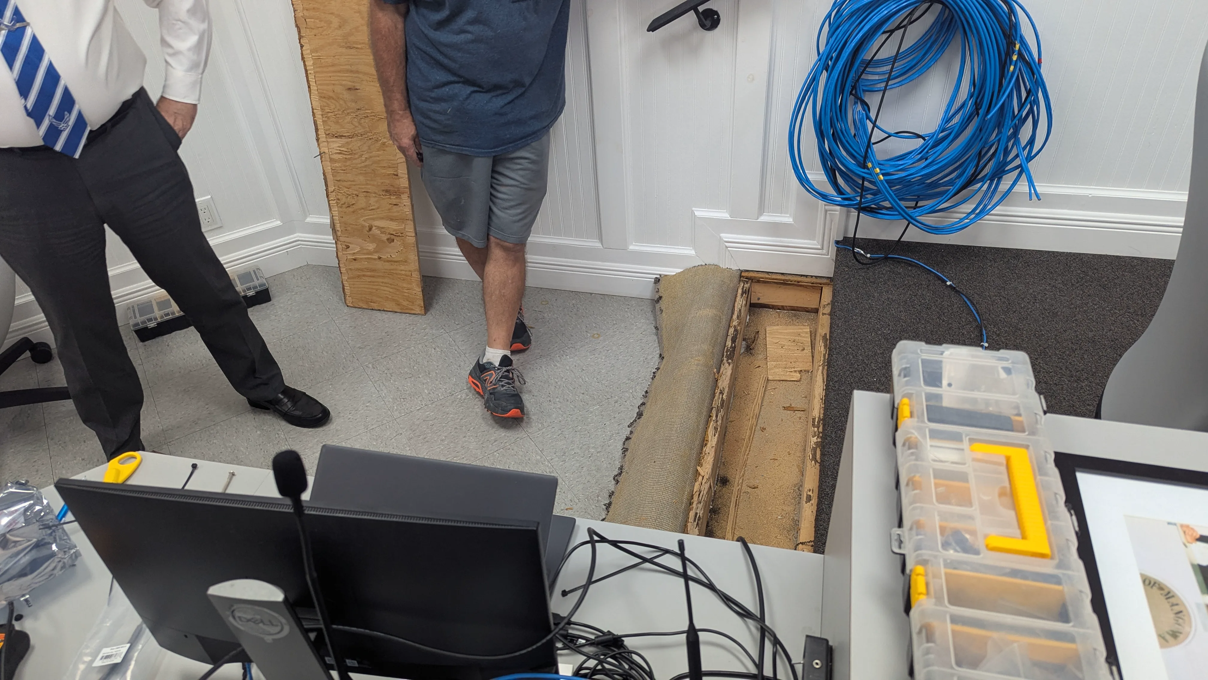New blue cable runs, monitor, and equipment during the Town of Mangonia Park Commission Chambers rebuild