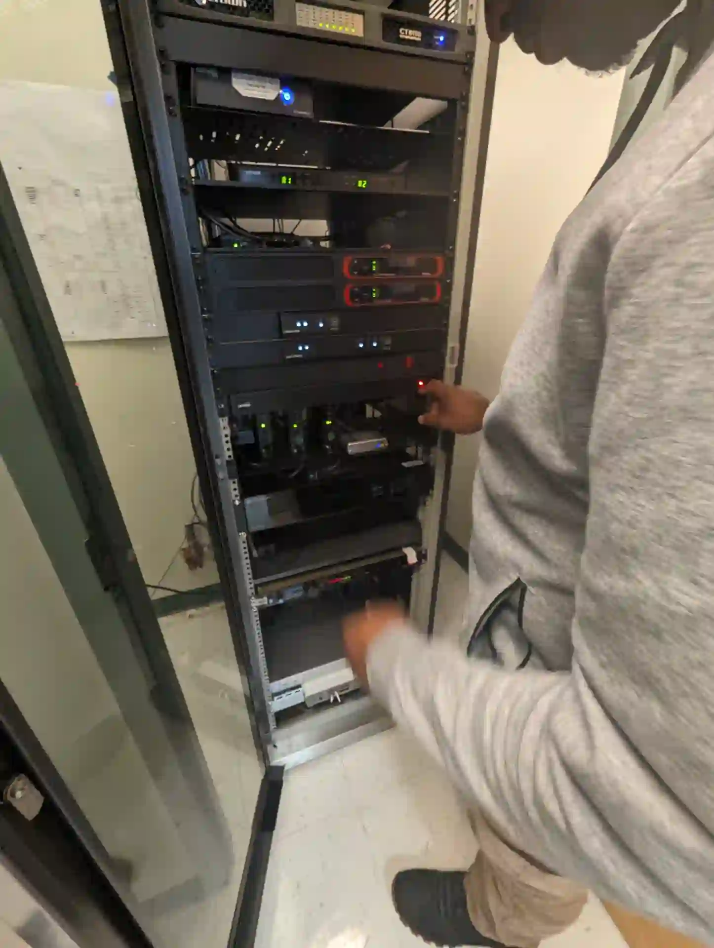 Equipment rack with encoders, decoders, and remote-production hardware installed by Primestar